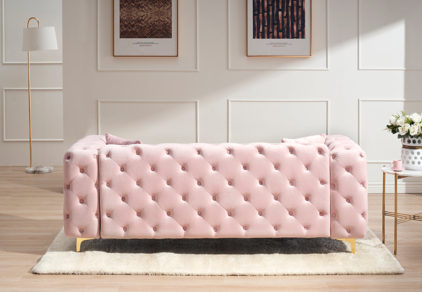 New design comfortable pink loveseat with two throw pillows in the same color