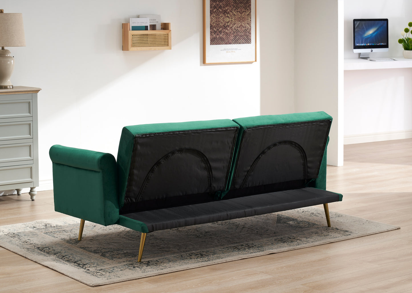 Green velvet nail head sofa bed with throw pillow and midfoot