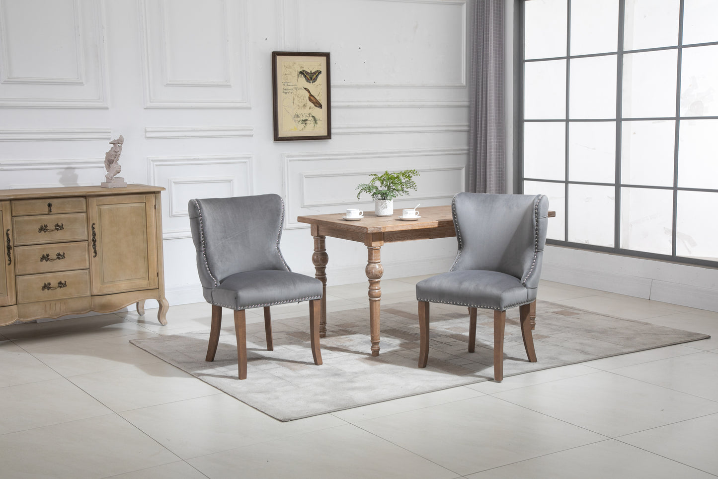 Set of 2 upholstered wing-back dining chair with backstitching nailhead trim and solid wood legs