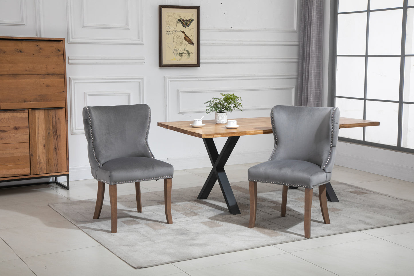 Set of 2 upholstered wing-back dining chair with backstitching nailhead trim and solid wood legs