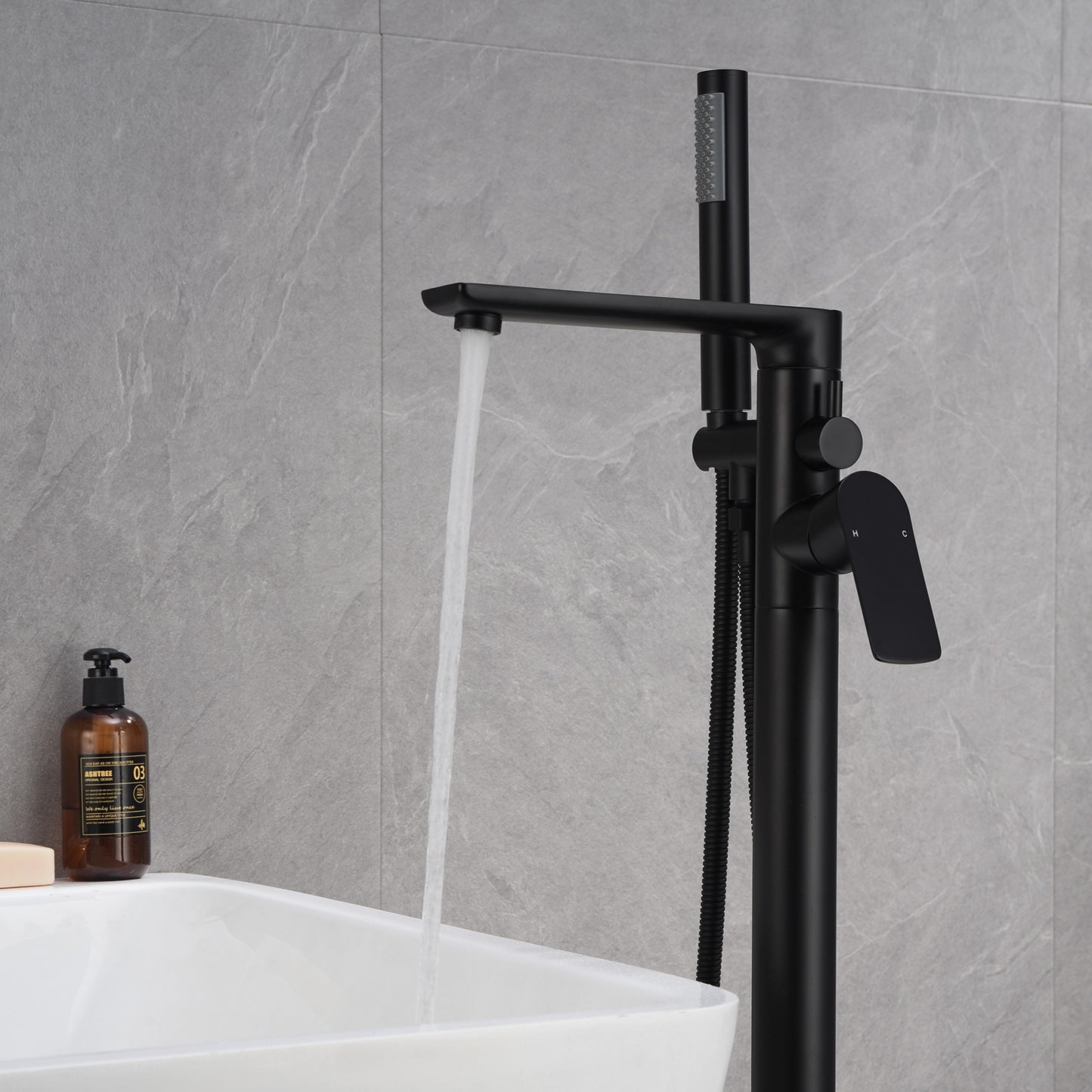 Single-Handle Freestanding Floor Mount Roman Tub Faucet Bathtub Filler with Hand Shower in Matte Black