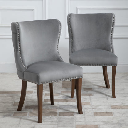 Set of 2 upholstered wing-back dining chair with backstitching nailhead trim and solid wood legs