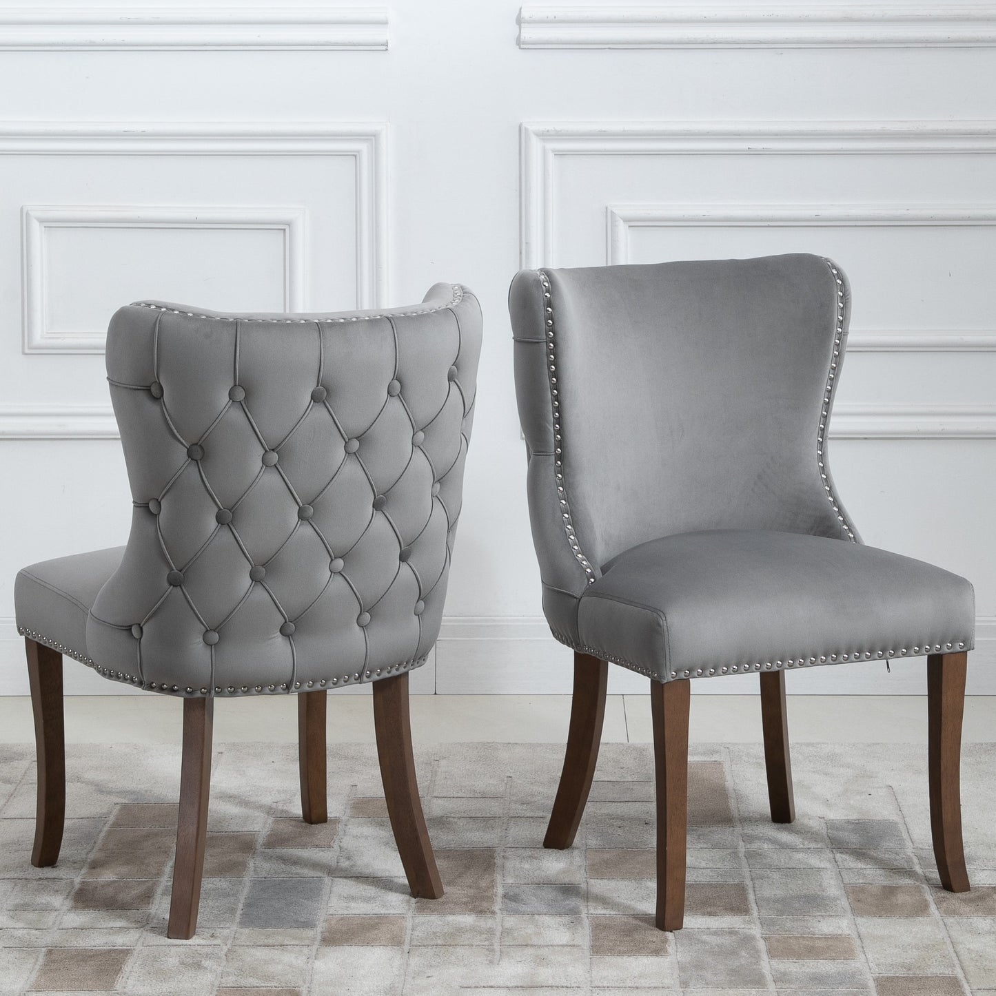 Set of 2 upholstered wing-back dining chair with backstitching nailhead trim and solid wood legs