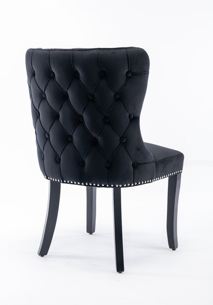 Set of 2 Black Velvet upholstered wing-back dining chair with backstitching nailhead trim and solid wood legs