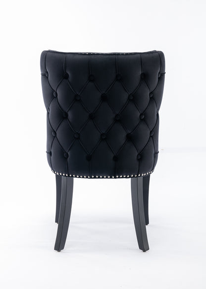 Set of 2 Black Velvet upholstered wing-back dining chair with backstitching nailhead trim and solid wood legs