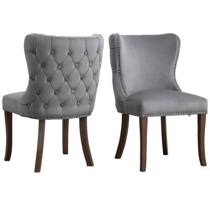 Set of 2 upholstered wing-back dining chair with backstitching nailhead trim and solid wood legs