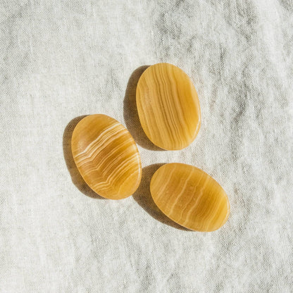 Yellow Calcite Worry Stone by Tiny Rituals