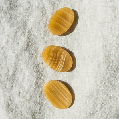 Yellow Calcite Worry Stone by Tiny Rituals