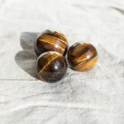 Tiger Eye Sphere with Tripod by Tiny Rituals