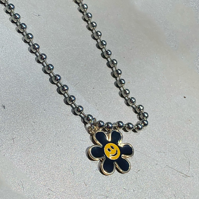 Black Flower Smiley Necklace by White Market