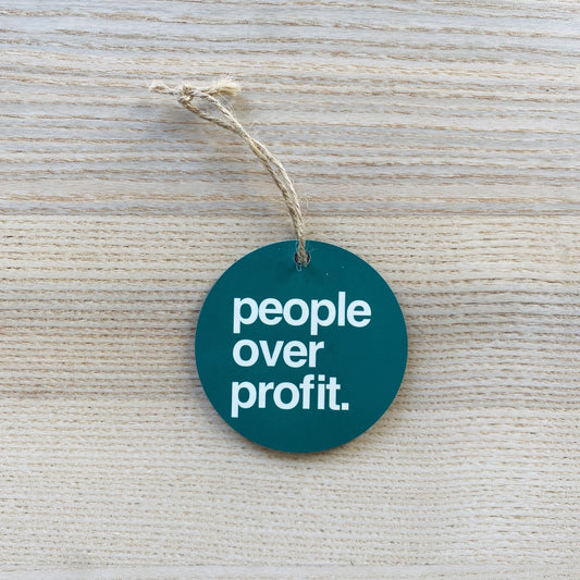 People Over Profit | Christmas Ornament by The Happy Givers