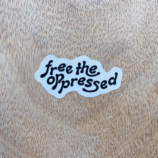 Free The Oppressed | Sticker by The Happy Givers