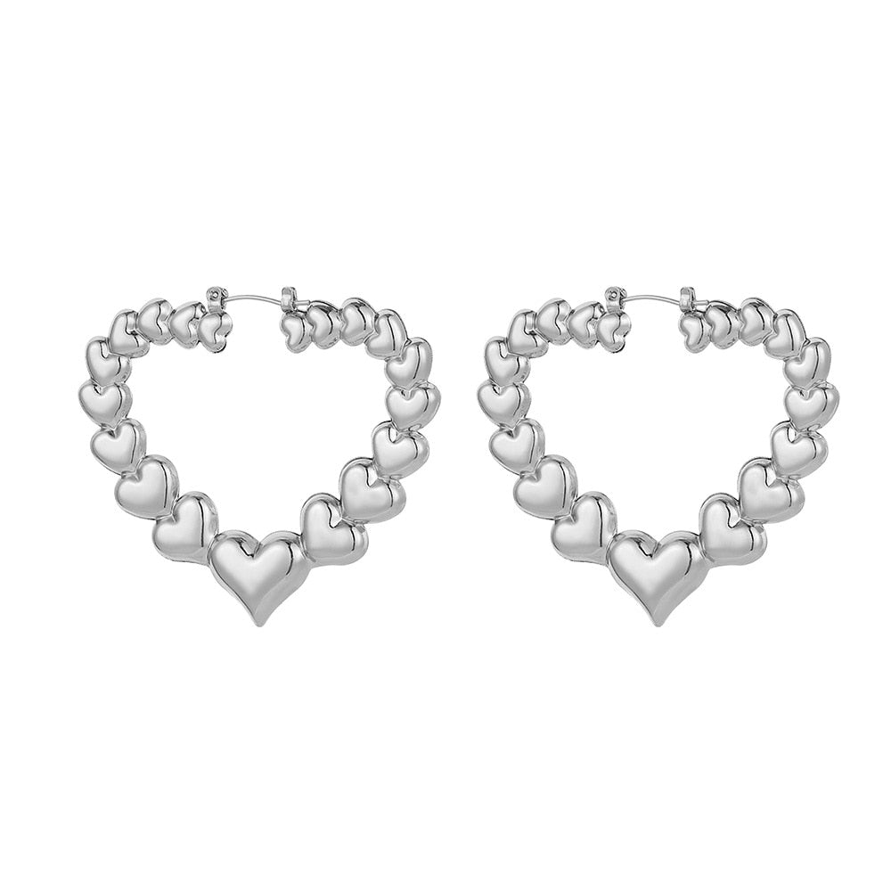 Ring of Hearts Earrings by White Market