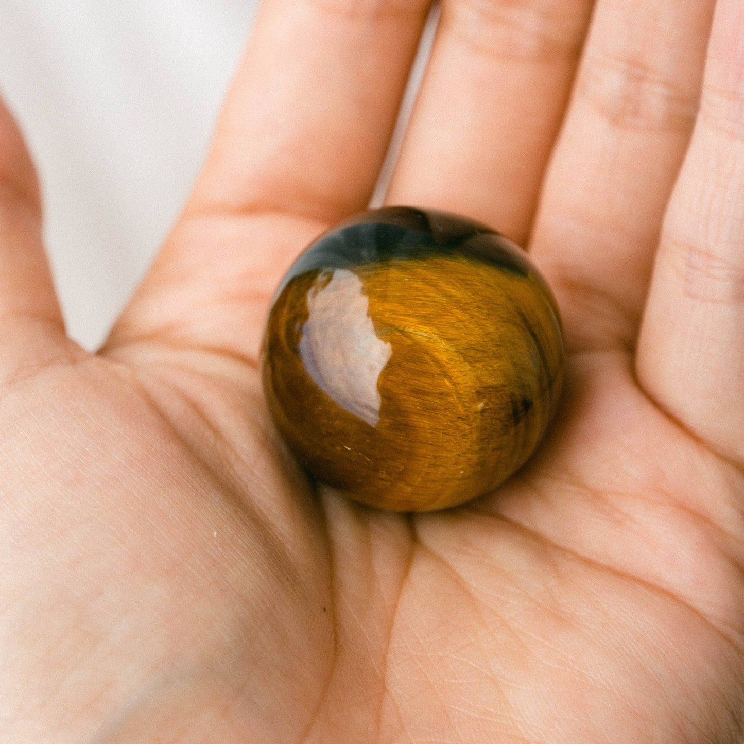 Tiger Eye Sphere with Tripod by Tiny Rituals