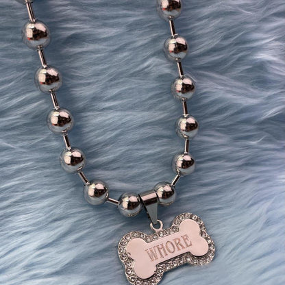 "Whore" Dog Bone Necklace by White Market