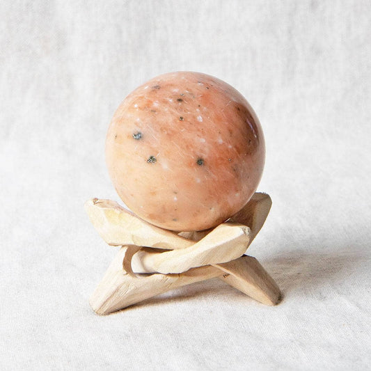 Orange Calcite Sphere with Tripod by Tiny Rituals