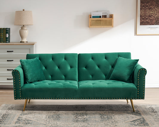 Green velvet nail head sofa bed with throw pillow and midfoot