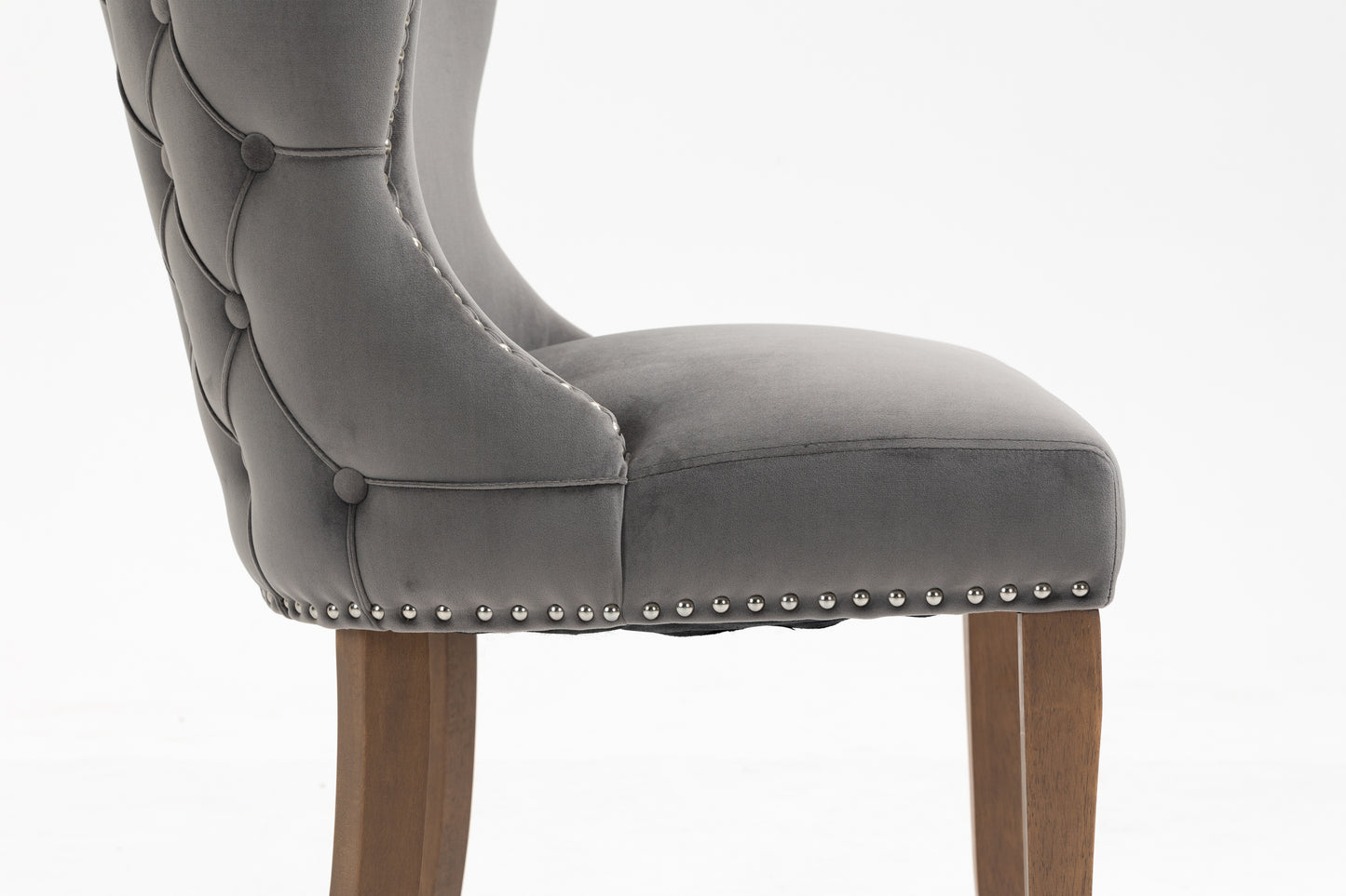 Set of 2 upholstered wing-back dining chair with backstitching nailhead trim and solid wood legs