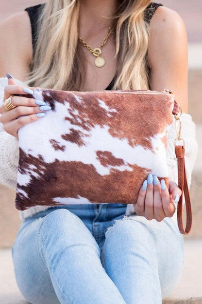 Faux Fur Cow Animal Print Clutch by VYSN