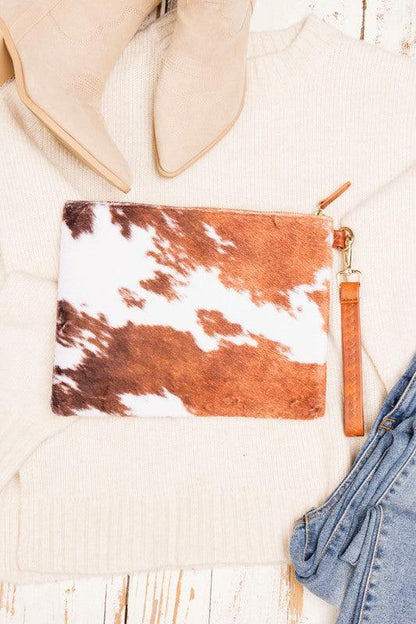 Faux Fur Cow Animal Print Clutch by VYSN