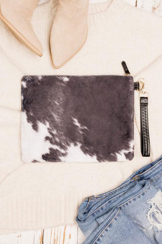 Faux Fur Cow Animal Print Clutch by VYSN