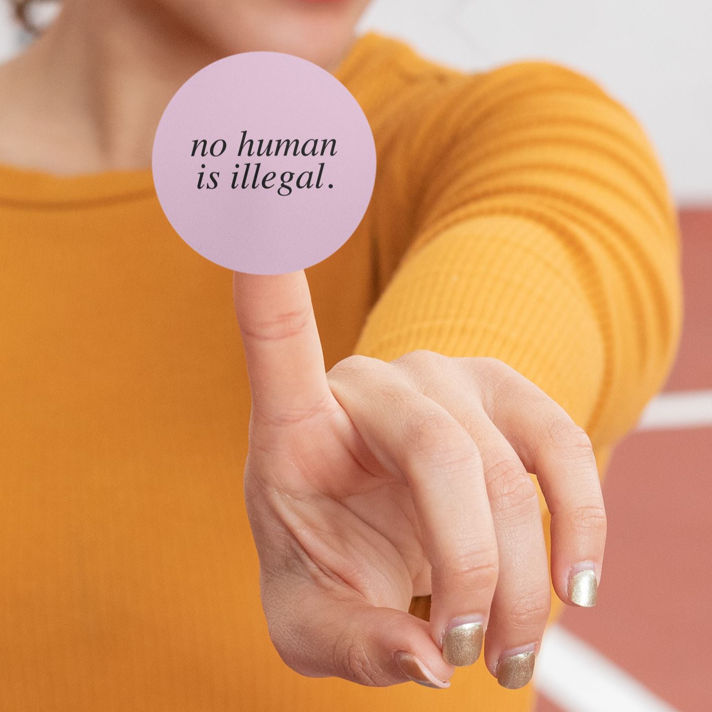 No Human Is Illegal | We Welcome Sticker by The Happy Givers