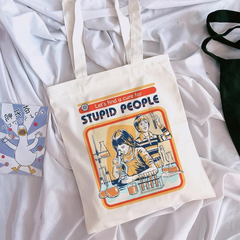 "Let's Find A Cure For Stupid People" Tote Bag by White Market