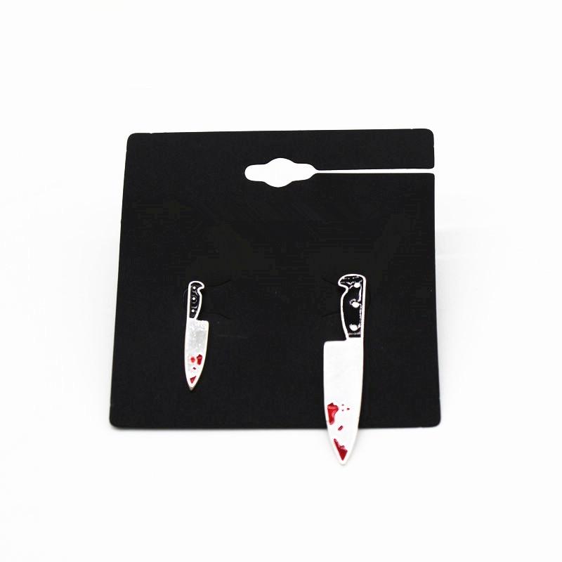 Knife Stud Earrings by White Market