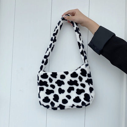 Black & White Cow Shoulder Bag by White Market