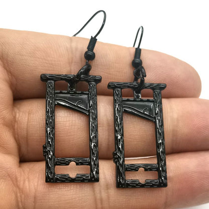 Mini Guillotine Earrings by White Market