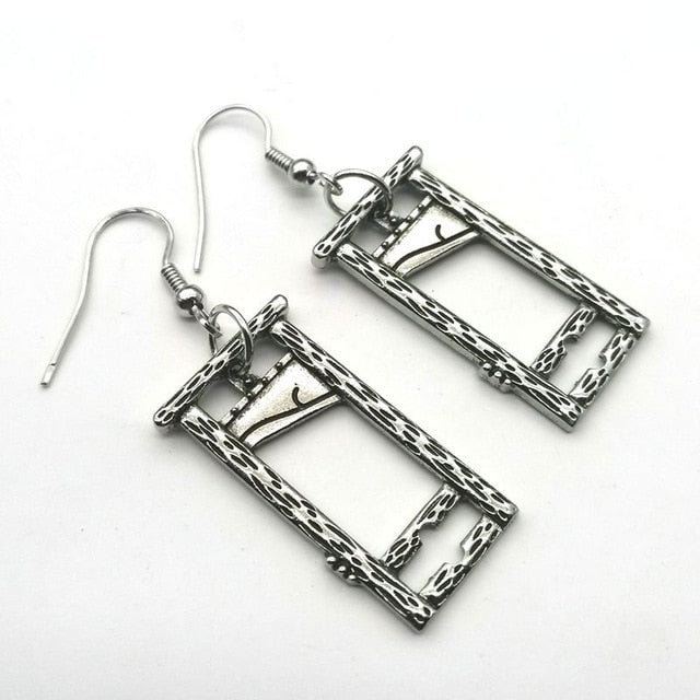 Mini Guillotine Earrings by White Market