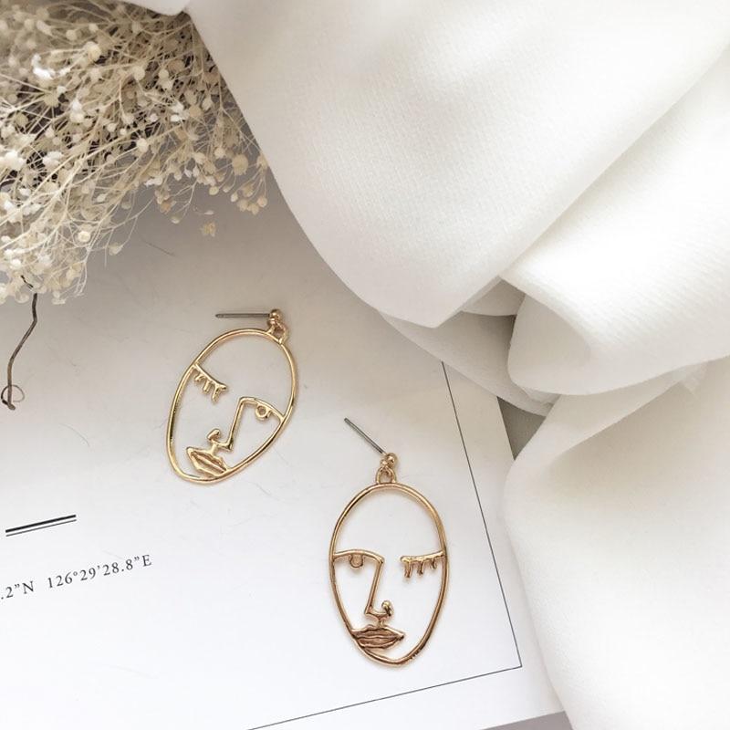 Abstract Portrait Earrings by White Market