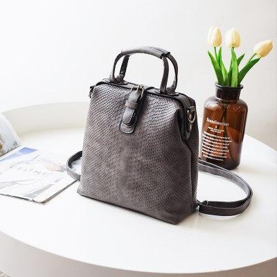 SERPENTINE VEGAN LEATHER BACKPACK by White Market