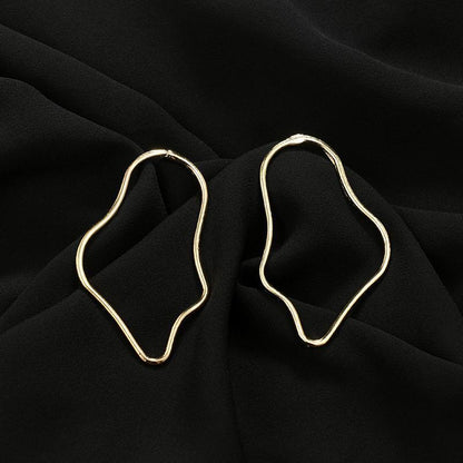 Asymmetrical Earrings by White Market