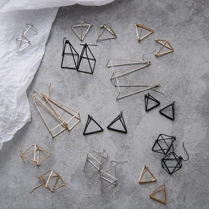 Geometric Skeleton Earrings by White Market