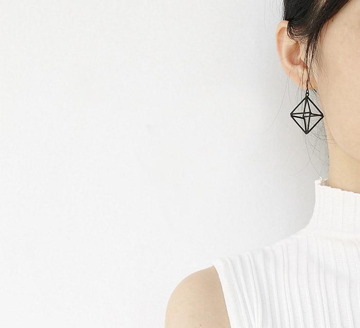 Geometric Skeleton Earrings by White Market