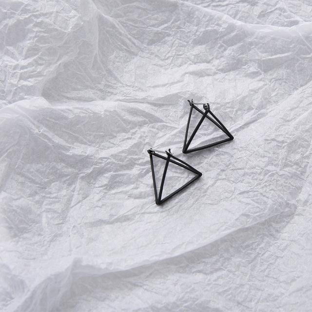 Geometric Skeleton Earrings by White Market