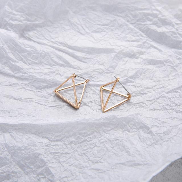 Geometric Skeleton Earrings by White Market