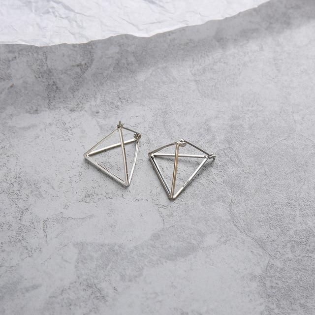 Geometric Skeleton Earrings by White Market