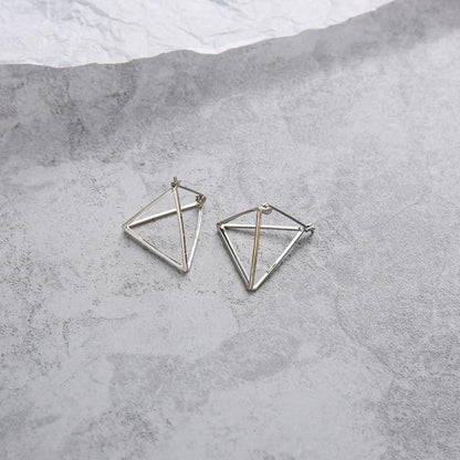 Geometric Skeleton Earrings by White Market