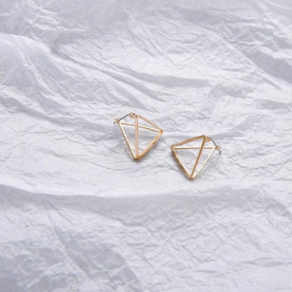 Geometric Skeleton Earrings by White Market