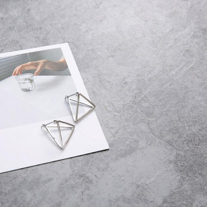 Geometric Skeleton Earrings by White Market