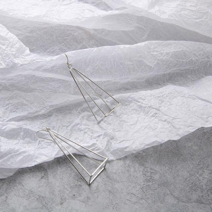 Geometric Skeleton Earrings by White Market