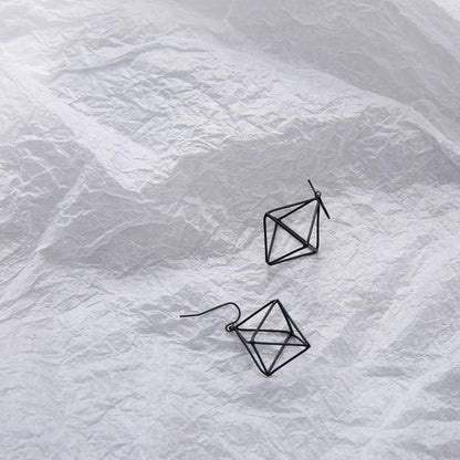 Geometric Skeleton Earrings by White Market