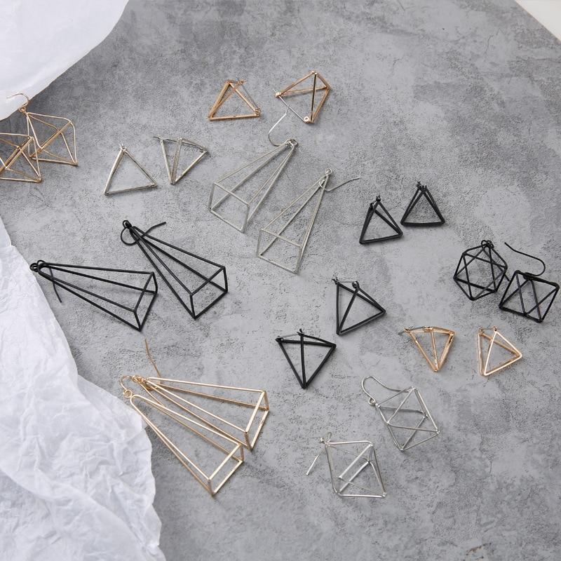 Geometric Skeleton Earrings by White Market